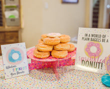 Load image into Gallery viewer, in a world of bages be a donut
